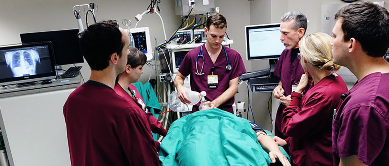 Medical students with simulated patient