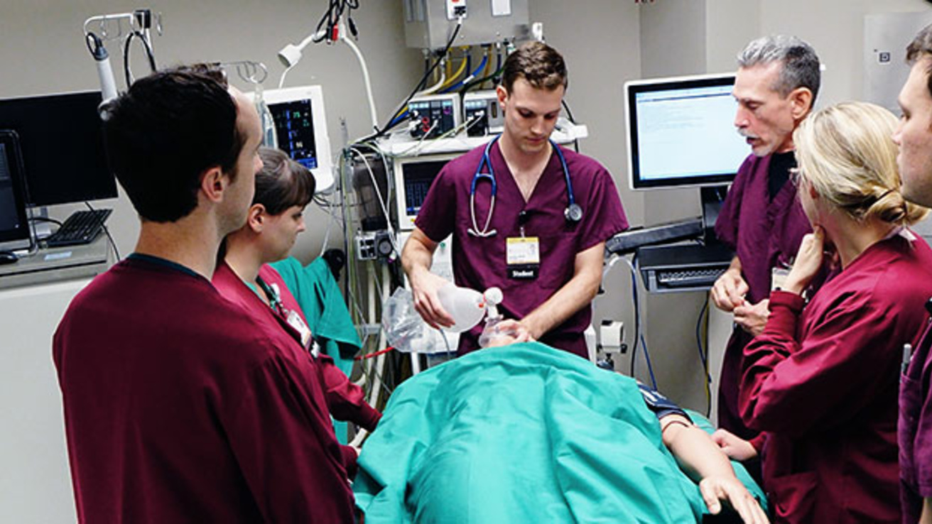 Medical students with simulated patient